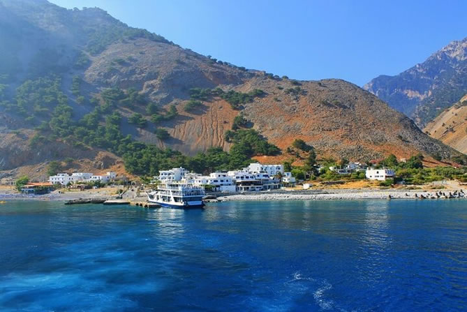 Walking the long gorge path with mountain views in Crete